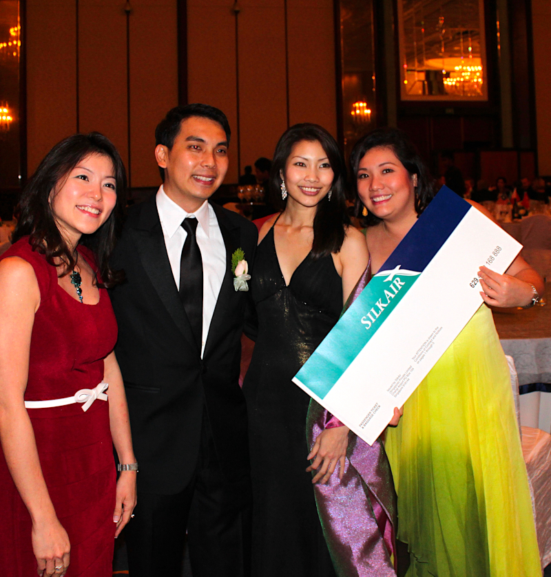 Celebrating a raffle win of SilkAir tickets to Cambodia with Mr. Yap Kwong Weng, UNAS Youth Council